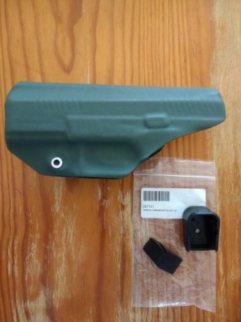 Saludos compañeros,

Pongo a la venta dos artículos. El primero es una funda Cz P10-C para porte oculto 00