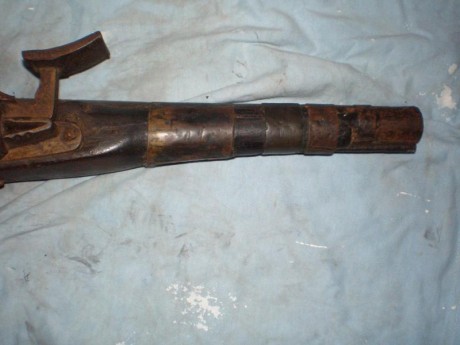 Pues eso, ha salido del trastero, y no puedo identificar solo he visto un rifle con el mismo mecanismo 12