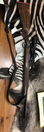 Vendo SAUER s303 classic madera grado 2 seleccionada entre varios rifles, con freno de boca dual break 02