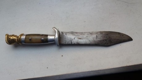 Hola me gustaría saber si alguien reconoce el logo de este cuchillo que encontré en el desván de casa 10