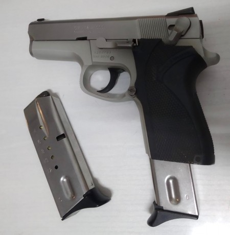 Se VENDE esta preciosa pistola SMITH & WESSON 6906, en acabado acero inoxidable, del calibre 9mm PB, 00