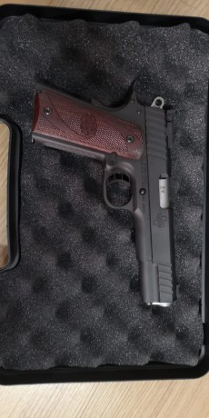 Vendo pistola STI Trojan 5" de 9 mm y kit del 22, muy poco uso, esta nueva. 
Es un arma de muy precisa 00