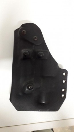 Vendo funda de kydex para pistola H&K USP COMPACT con módulo linterna y láser. En perfecto estado 00