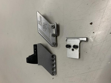 Hola buenas vendo tres monturas y un visor Trijicon
1ª es una montura RHT para pistolas 2011(Sti,Sps y 02