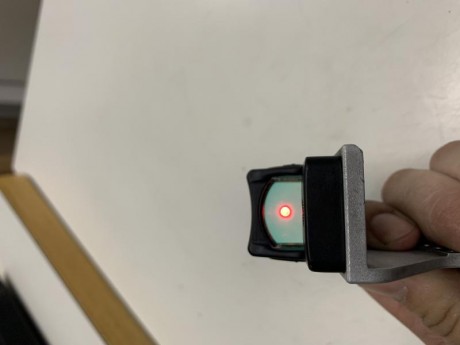 Hola buenas vendo tres monturas y un visor Trijicon
1ª es una montura RHT para pistolas 2011(Sti,Sps y 00