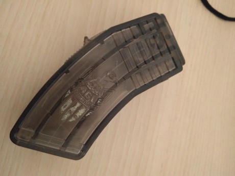 Vendo este cargador transparente de 10 balas para la ruger 10/22, es de la marca Eagle International, 01