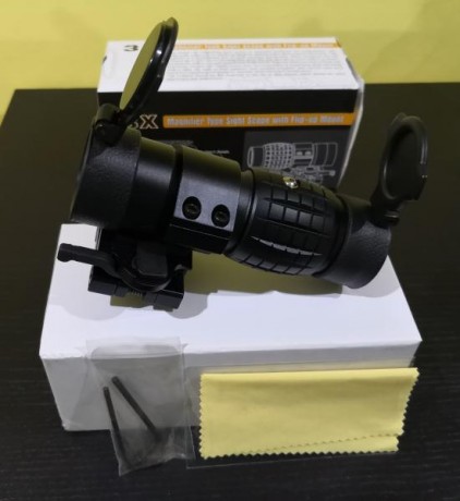 Vendo este magnificador 3x, con una lente un poco más grande de lo normal (30mm en lugar de 20mm), con 01