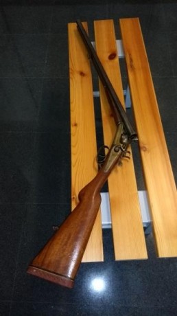 Vendo escopeta perrillos marca WOLF calibre 12 en perfecto estado funcionamiento pero más que nada de 01