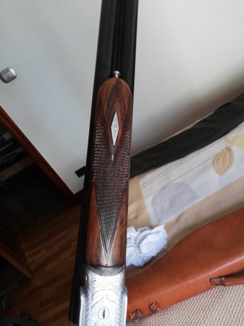 Bascula de muy labrada, pavonada y barnizada muy buen estado. Tres y una estrellas, 70cañon.me pone las 11