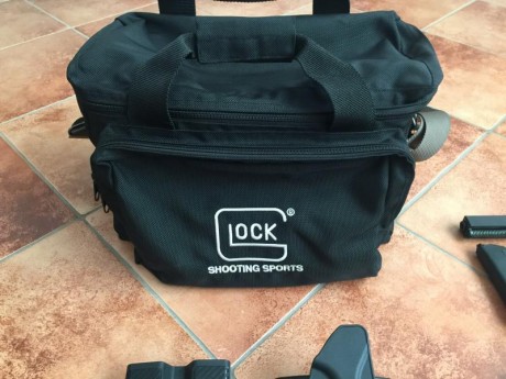 Vendo pistola glock 35, calibre .40 con 4 cargadores, maletín original, funda blackhawk, portacargador 10