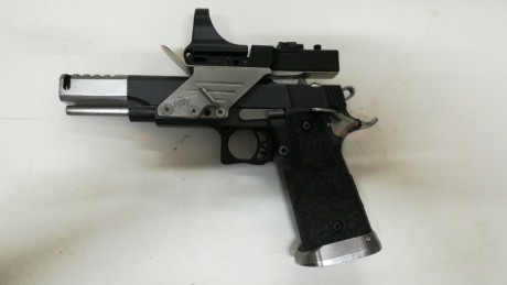 Vendo pistola Sps  de open.viene con 2 carros de 38sa y 9mm que es el que esta montado .
se nitruro entera 01