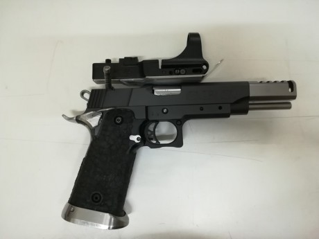 Vendo pistola Sps  de open.viene con 2 carros de 38sa y 9mm que es el que esta montado .
se nitruro entera 00