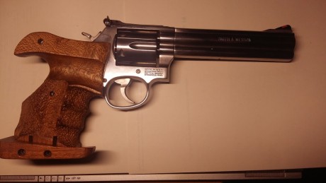 Pongo a la venta mi Revolver Smith Welsson de seis pulgadas  guiado en F estoy quitando cosillas por la 02