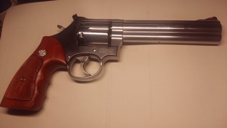 Pongo a la venta mi Revolver Smith Welsson de seis pulgadas  guiado en F estoy quitando cosillas por la 21