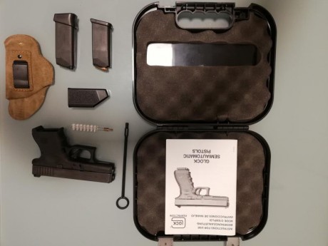 Pistola compacta 9 mm parabellum. Se han efectuado 50 disparos como mucho.
Con funda interior y cargador 01