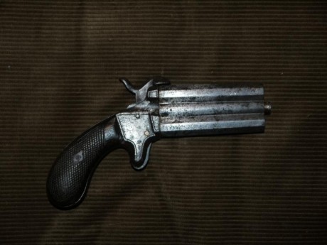 Vendo pistola Lefaucheaux, cal 9mm, con cañones superpuestos rotatorios, fabricación belga. Estado aceptable 00