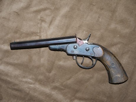 Vendo pistola sistema Remington, rolling block, cal 12mm, fuego central. Fabricación española. Buen estado. 00