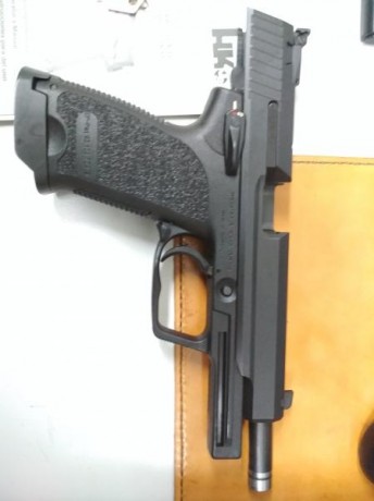 Vendo mi HK USP EXPERT de 9mm parabellum adquirida y utilizada en una sola competición. Se incluyen dos 00