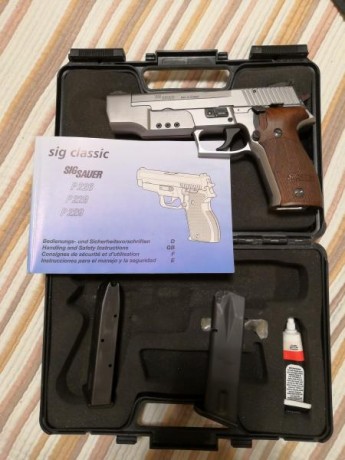 Vendo pistola sig sauer modelo p226 sport. Con compensador. 
Disparador modificado de serie. 
Cachas de 01