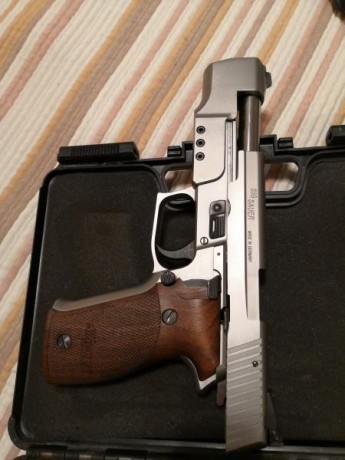 Vendo pistola sig sauer modelo p226 sport. Con compensador. 
Disparador modificado de serie. 
Cachas de 00