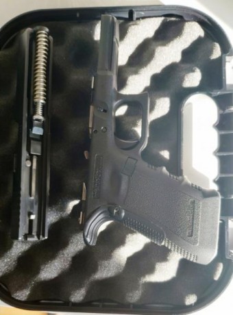 Vendo Glock 17 gen 3....con muchos extras...miras zev.... muelles dpm system... aliviador disparador.... 22
