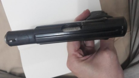 Hola buenas vendo Astra 300 con 2 cargadores uno negro y otro cromado en libro de coleccionista en un 01