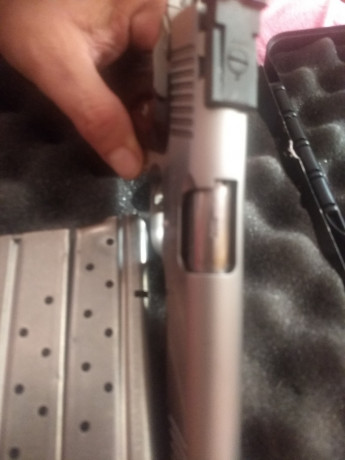vende Kimber MFG stainless gold match II, 2carros uno del 9 y otro del 22lr, con dos cargadores de cada, 12