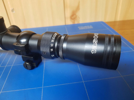 Vendo visor Tasco 6–24x 44mm con retícula Fine-X Dot, ajuste de paralelaje delantero, tapas frontales 01