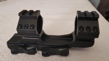 vendo montura mono pieza de aluminio para visor de 30 mm tiene sujeción de montaje rápido y rail weaver 00