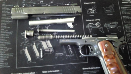 Pongo a la venta, (NO CAMBIOS) mí Taurus PT 1911 .45 ACP por 500 € con todo lo que se ve en la foto, que 71