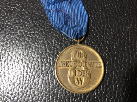 Medalla de ocho años de servicio de la SS reproduccion de calidad 85 euros.
Hebilla de tropa de la SS 01