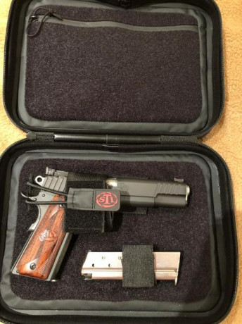 Buenas.

Un compañero quiere vender una STI Trojan de 5 pulgadas, con dos cargadores. Es la última versión, 01