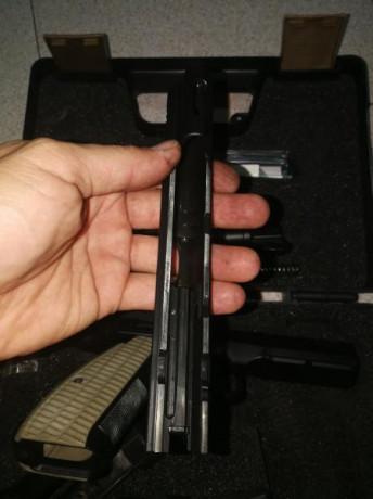 De febreo de 2018, 2.jpg  1.jpg  5000 disparos, con cachas incluidas(foto) mas las originales. Maletín 31