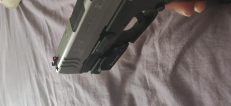 Cañón de 3.8 pulgadas. Guiada en A. Esta en Málaga, 3 cargadores, dos de 19 y uno de 13, funda fobus tiene 70