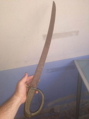 Hola buenas noches
Tengo un sable desde hace años, su antiguo dueño decía que era de la guerra de Cuba. 00