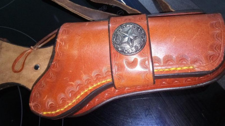 FUNDA CUERO REVOLVER 45 LC PEACEMAKER

FUNDA NUEVA SIN USO, EN PERFECTO ESTADO, CON DISPARADOR OCULTO. 01