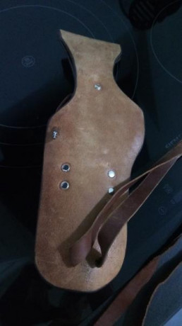 FUNDA CUERO REVOLVER 45 LC PEACEMAKER

FUNDA NUEVA SIN USO, EN PERFECTO ESTADO, CON DISPARADOR OCULTO. 00