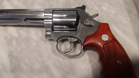 Pongo a la venta mi Revolver Smit Welsonn modelo 686 calibre 38-357 cromado, doy tres modelos de cachas, 00