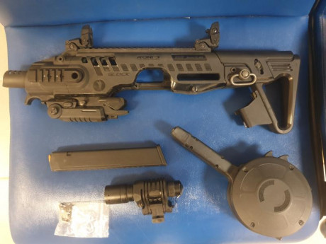 Se vende kit Roni G2 para glock 17 y 19, en excelente estado y que incluye miras abiertas, maletines original, 01