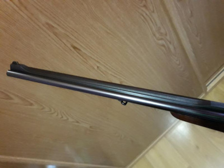 un amigo vende un rifle express Merkel 140 calibre 9,3x74r expulsor lleva un aimpoint  micro h2 balea 12