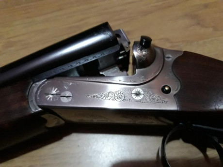 un amigo vende un rifle express Merkel 140 calibre 9,3x74r expulsor lleva un aimpoint  micro h2 balea 10