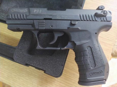 se vende walther P22, muy pocos disparos, lleva dos cargadores y su maletin.  tiene el cañon que termina 00