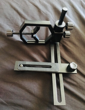 Buenas vendó adaptador para acoplar una cámara o móvil al visor por 15 € solo entrego en mano por la zona 00