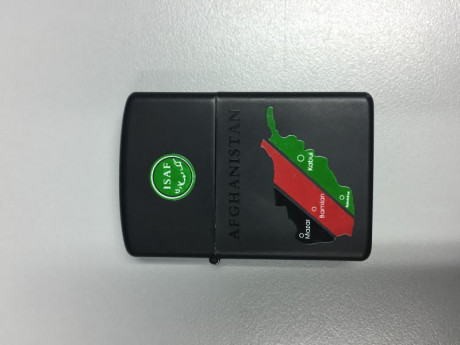 Se vende funda/carcasa para zippo de la Isaf traída de Afganistán. 15 euros. 652167719. 00