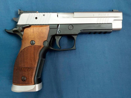 Hola vendo pistola Sig Sauer P226  cañon de 5 pulgadas en calibre 9 mm dos cargadores poco uso unos 500 01