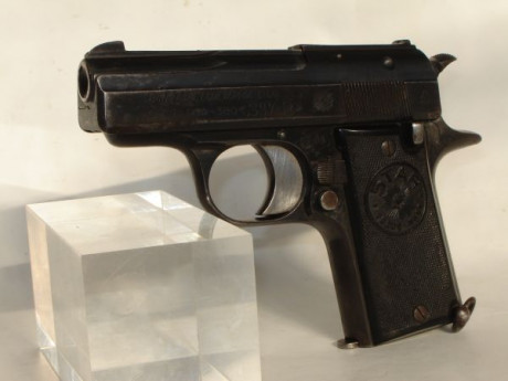 Buenos días.

¿Alguien conoce cuál es el modelo y el año de fabricación de esta pistola Star, de calibre 10
