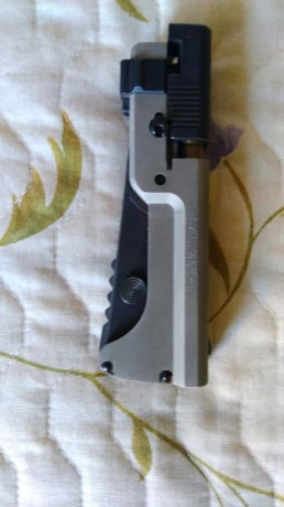 Vendo Pistola PRESSIN 7.65 en muy buen estado, edición limitada y numerada, con munición y funda. La tengo 01