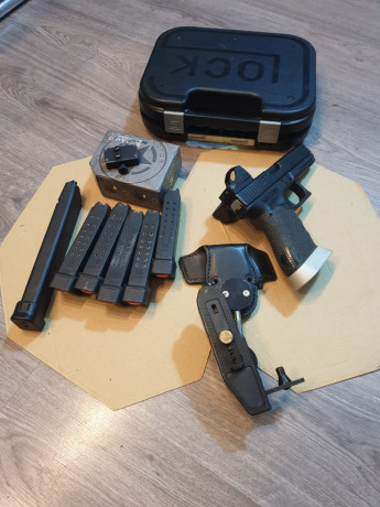 En buen estado 450 € con 4 Cargadores cinto funda todo lo que se ve en la foto menos el cargador largo 00