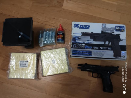 Vendo una sigue Sauer x five p226 blow back, la pistola tiene unos años pero la he usado unas cuantas 01