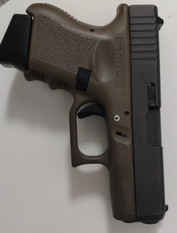 Vendo Glock 26 color verde militar muy poco uso entrego con maletín llave para cambiar miras y 5 cargadores...3 02